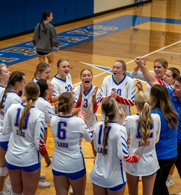 Lake Volleyball celebrating after big upset against Hoover. 