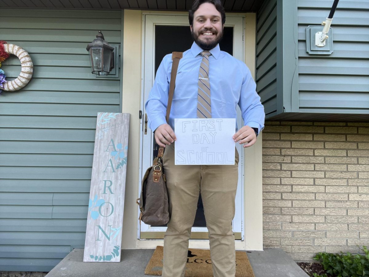 Mr. Aaron may be a teacher now, but he still poses for the first day of school.